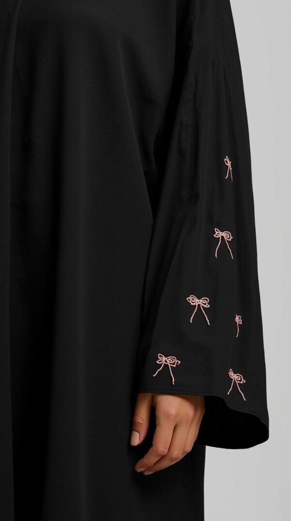 Black Abaya with Pink Bow Embroidery by ZEEFAH Clothing and Tailoring in Islamabad