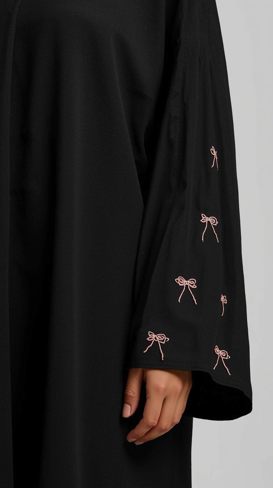 Black Abaya with Pink Bow Embroidery by ZEEFAH Clothing and Tailoring in Islamabad