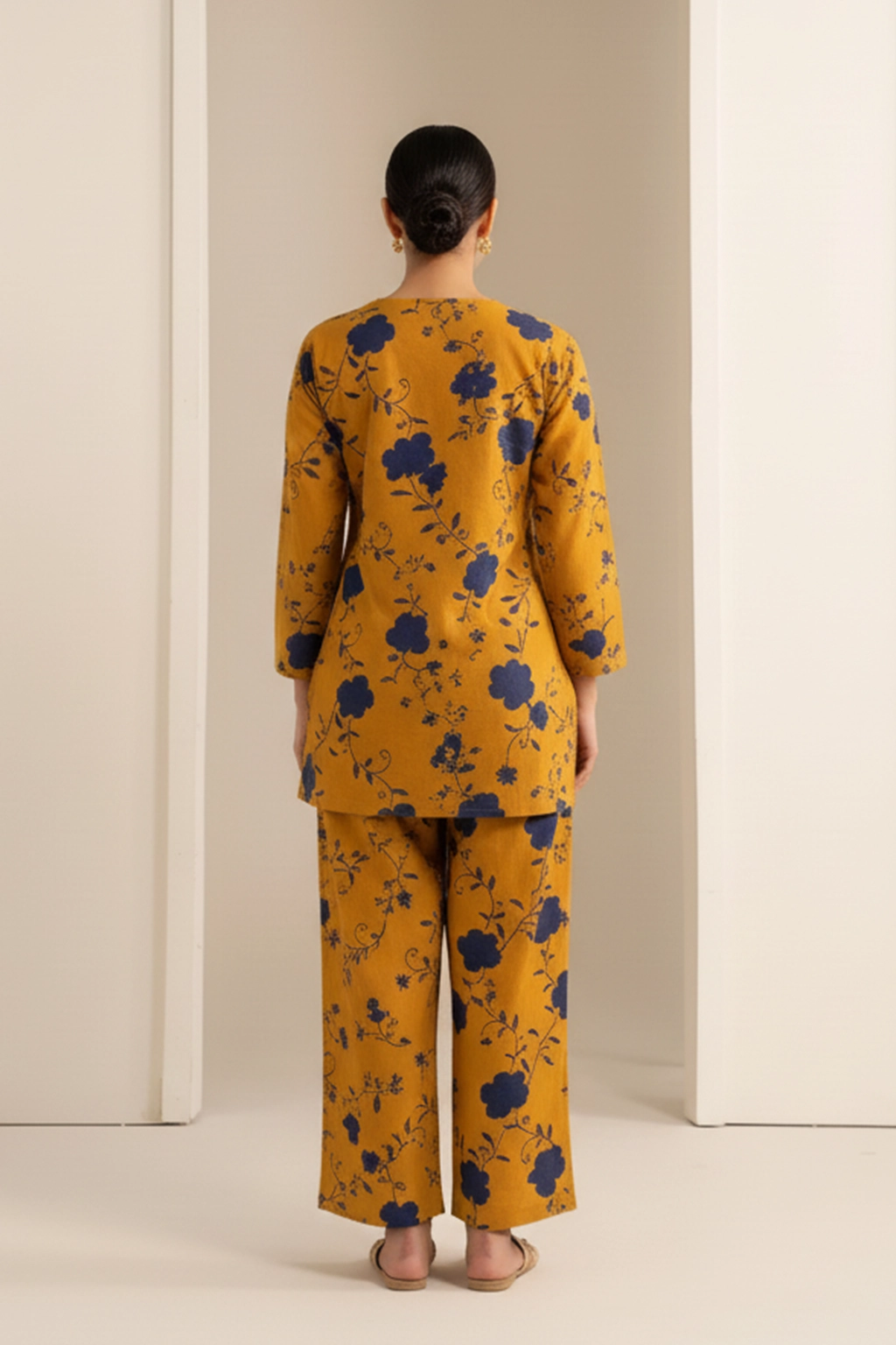 Mustard Bloom Khaddar Co-ord Set by ZEEFAH Clothing and Tailoring — two-piece women’s winter outfit in mustard with navy floral print