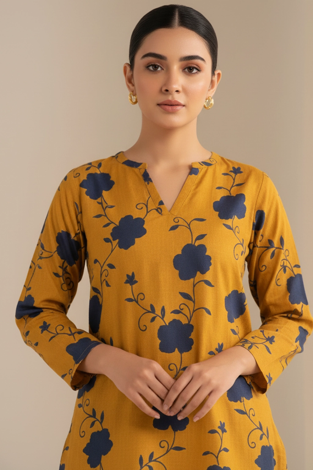 Mustard Bloom Khaddar Co-ord Set by ZEEFAH Clothing and Tailoring — two-piece women’s winter outfit in mustard with navy floral print