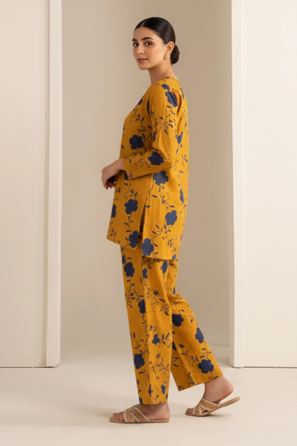 Mustard Bloom Khaddar Co-ord Set by ZEEFAH Clothing and Tailoring — two-piece women’s winter outfit in mustard with navy floral print