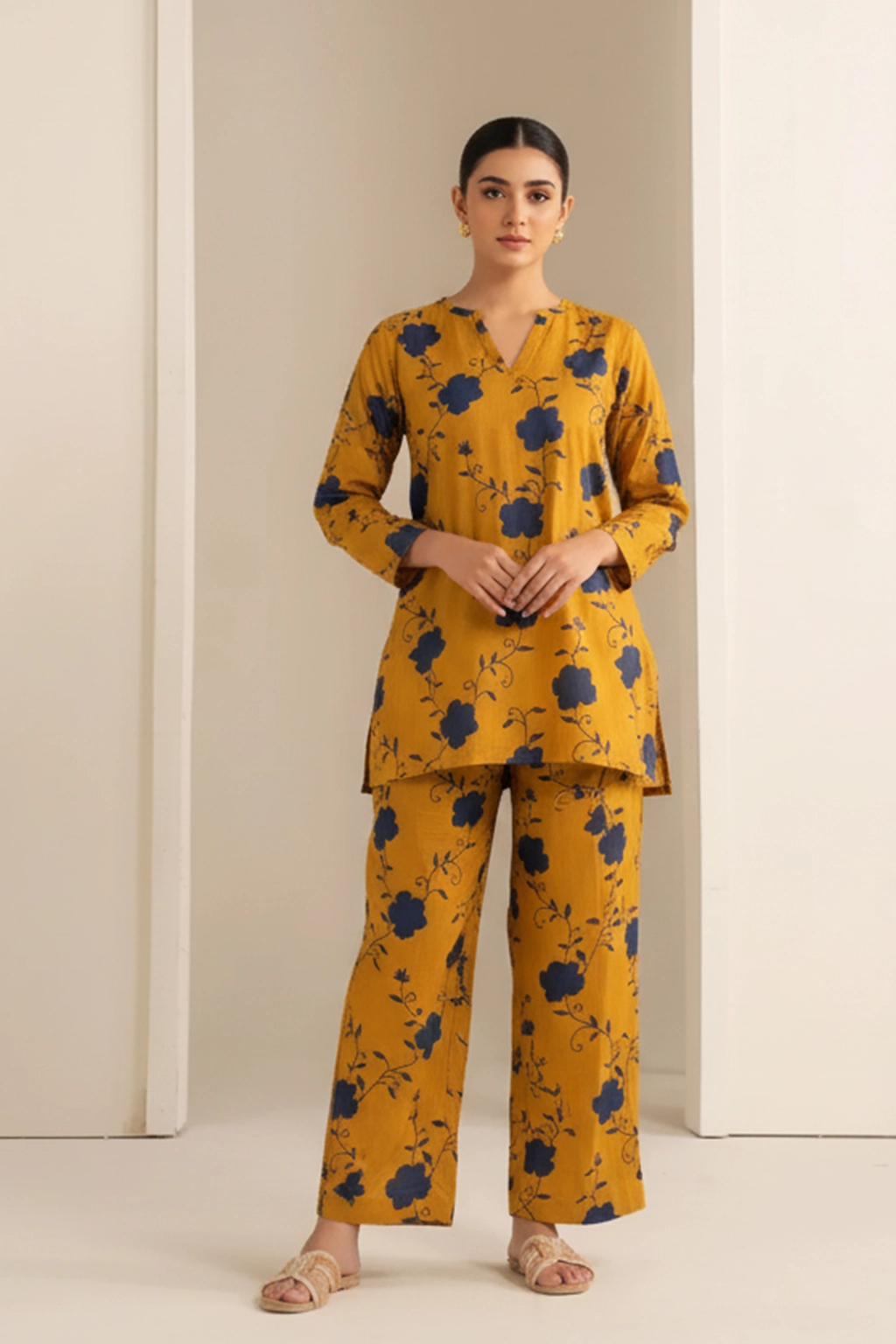 Mustard Bloom Khaddar Co-ord Set by ZEEFAH Clothing and Tailoring — two-piece women’s winter outfit in mustard with navy floral print